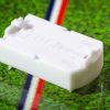 White plastic electric football bases