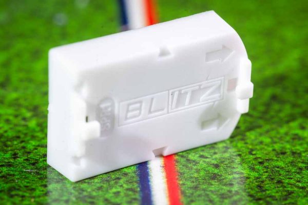 White plastic electric football bases