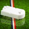 White plastic electric football bases