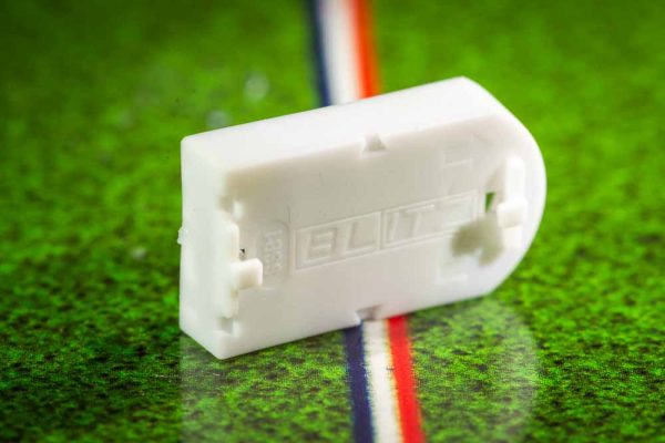 White plastic electric football bases